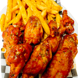 Chicken wings with fries and dipping sauce: