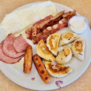 Two Eggs With Bacon, Bangers, Ham and perogies