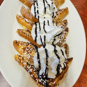 Three Slice of French Toast With Whipping Cream